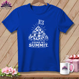 Blue t-shirt with white graphic of stacked quilts, flag, mountains, and text 