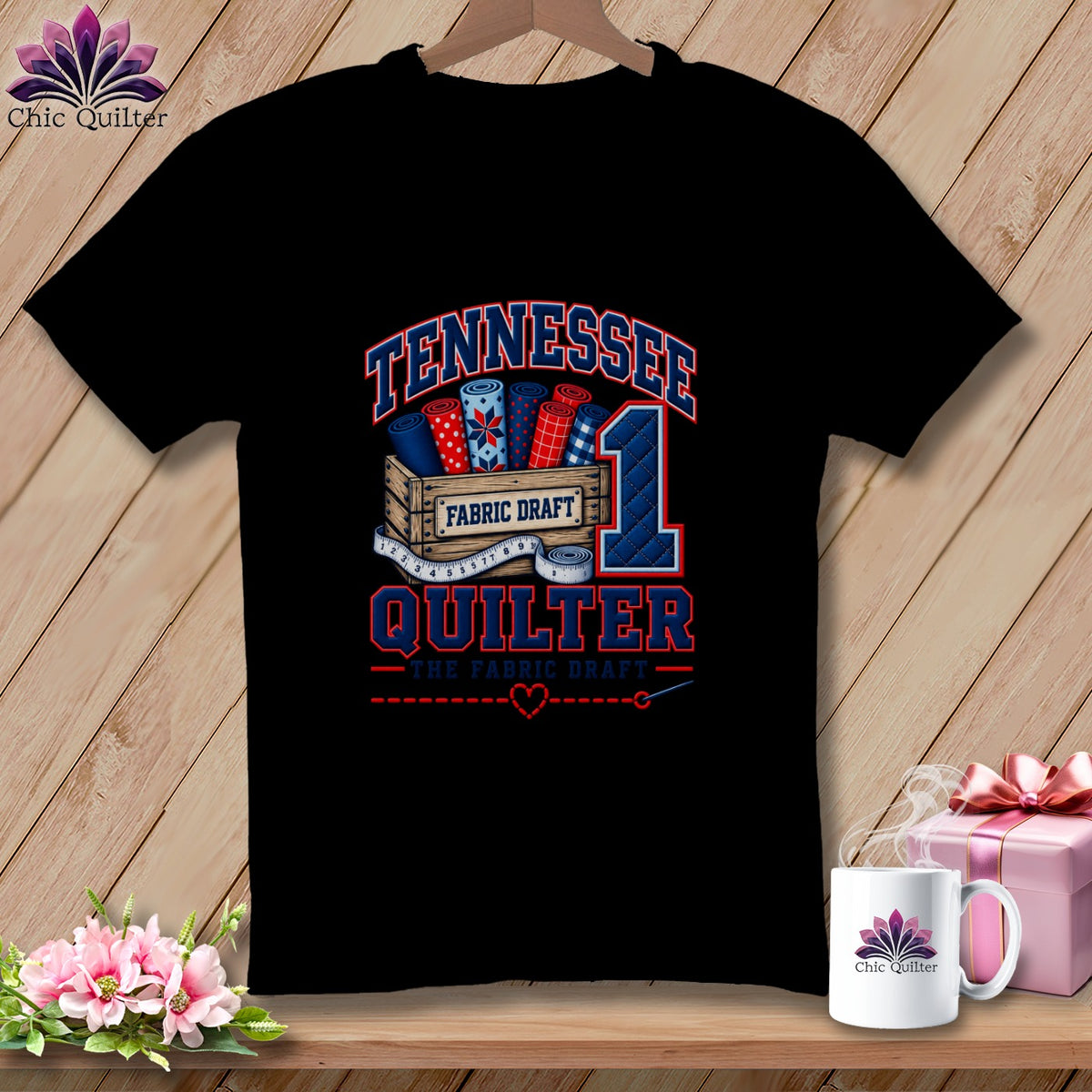 A black t-shirt features a graphic with the text Tennessee Quilter, fabric bolts, and a number one.