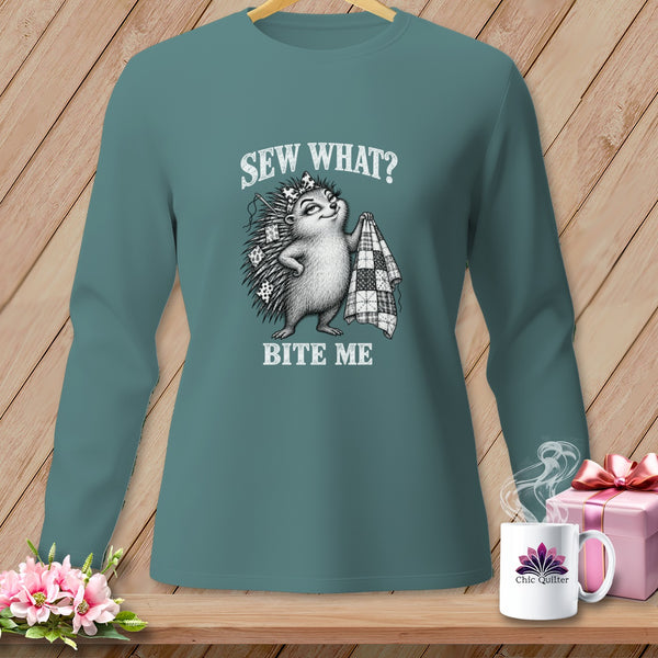 Teal long-sleeve shirt featuring a graphic of a hedgehog holding a quilt and text reading Sew What Bite Me.