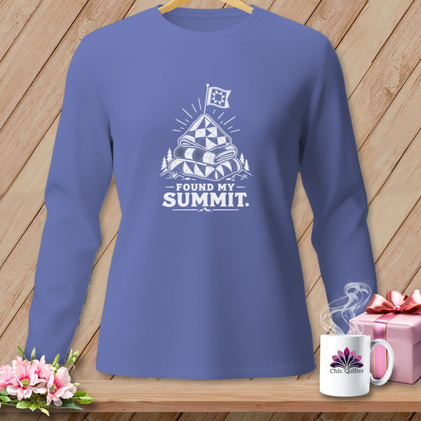 Long sleeve shirt with white graphic of folded quilts and "Found My Summit." text.