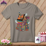 Quilting house illustration on t-shirt with ghosts, books, and sewing notions.