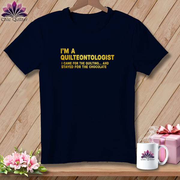 Navy t-shirt with "I'm a Quilteontologist" and quote.