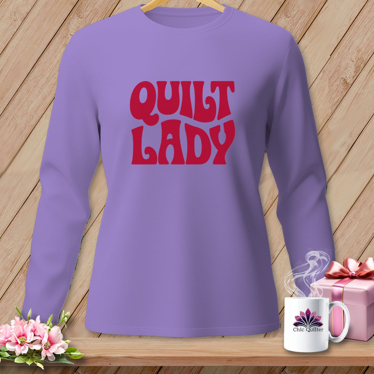 Lavender long-sleeve shirt with red "Quilt Lady" text and Chic Quilter mug.