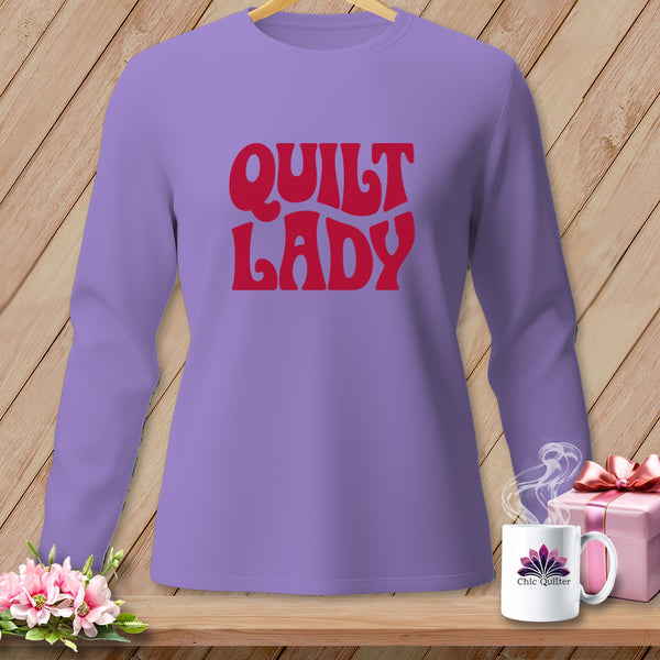 Lavender long-sleeve shirt with red "Quilt Lady" text and Chic Quilter mug.