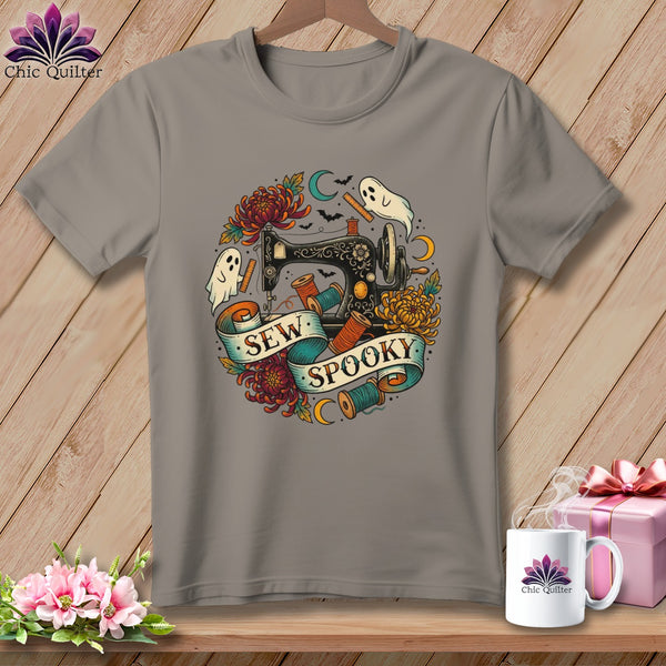 Gray t-shirt with "Sew Spooky" text, sewing machine, ghosts, and flowers.