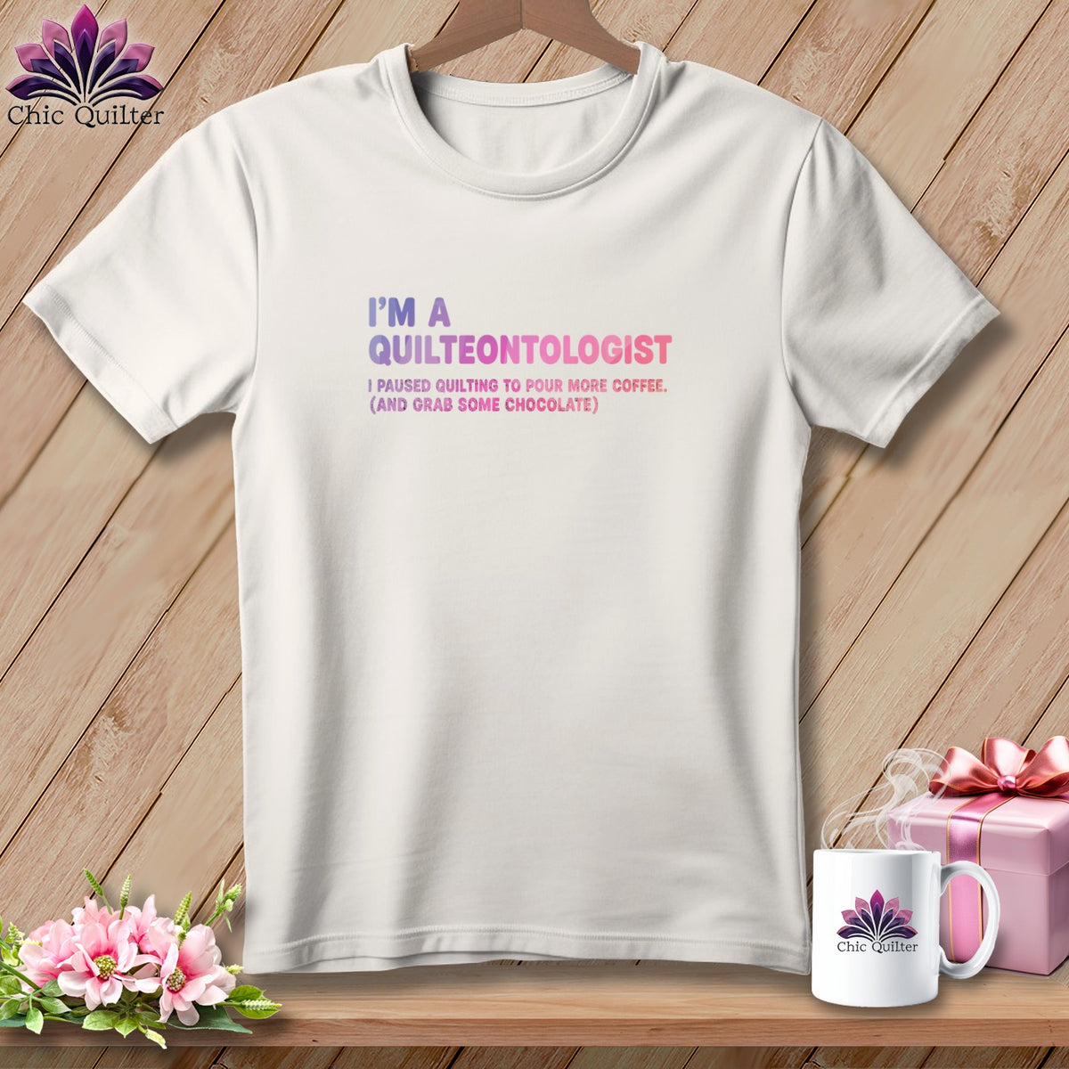 White t-shirt with "I'm a Quilteontologist" and coffee/chocolate text.