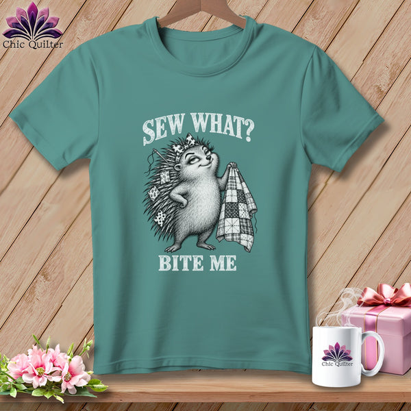 Teal t-shirt featuring a hedgehog holding a quilt and the text Sew What? Bite Me.
