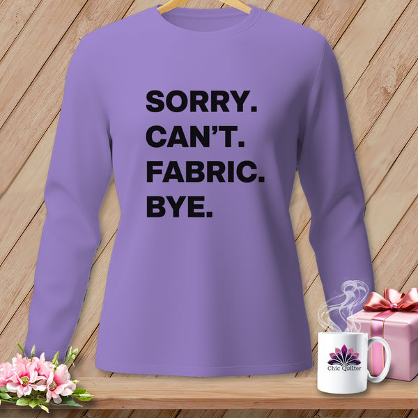 Lavender long sleeve shirt with black text reading "Sorry. Can't. Fabric. Bye."