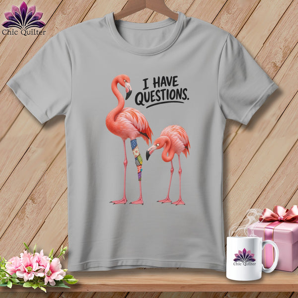 Grey t-shirt with two flamingos and text "I HAVE QUESTIONS."