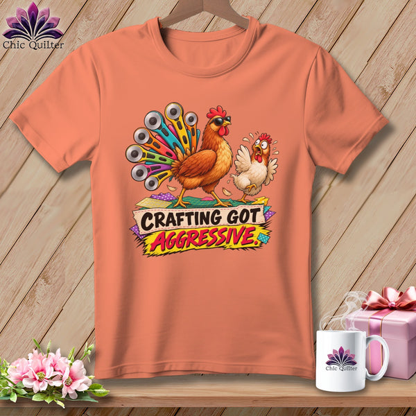 Orange t-shirt with cartoon chickens and text "Crafting Got Aggressive".