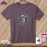 T-shirt with sketch of armchair, blanket, and mug, featuring text 