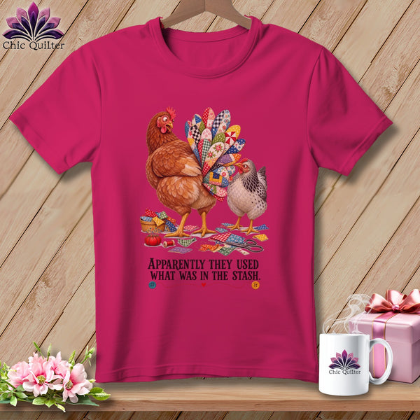 Two chickens, one with a quilt-like tail, stand on fabric scraps with scissors and a thimble.