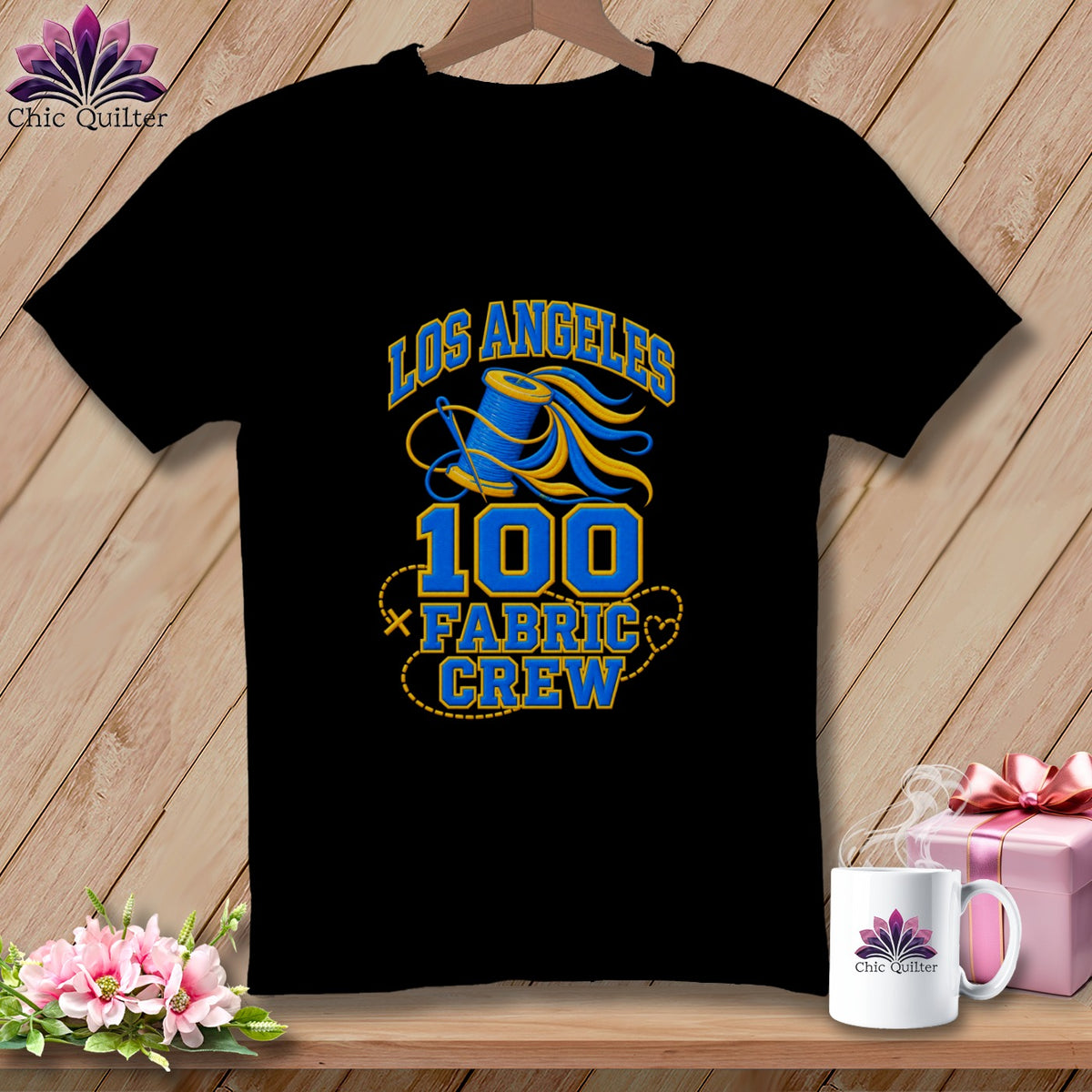 A black t-shirt featuring a blue and yellow graphic with text reading Los Angeles 100 Fabric Crew.