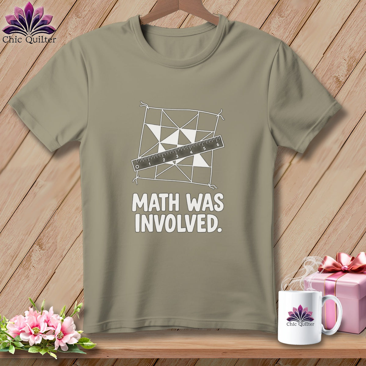 T-shirt with a geometric quilt pattern, ruler, and text "Math Was Involved."