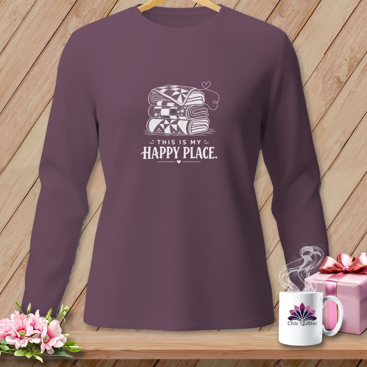 Long-sleeve shirt with stacked quilts graphic and "This is My Happy Place" text.