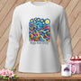 White long-sleeve shirt with a "Gogh Sew Crazy" print featuring a Starry Night-inspired sewing basket.