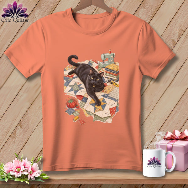 Black cat on quilt with sewing supplies.