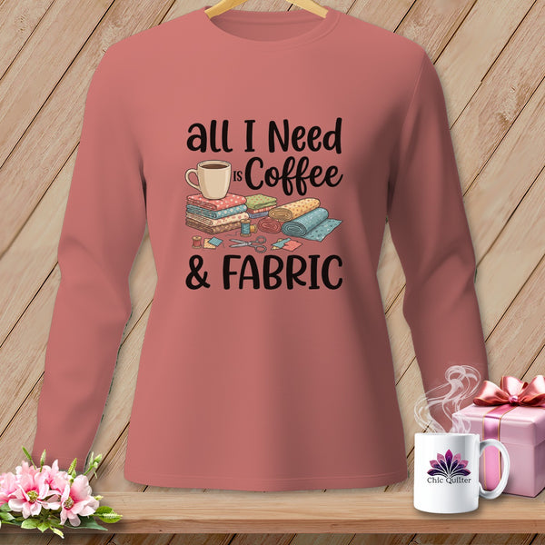 Long-sleeve shirt with "All I Need is Coffee & Fabric" graphic and sewing notions.