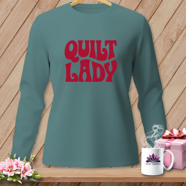 Teal long-sleeve shirt with red "QUILT LADY" text.