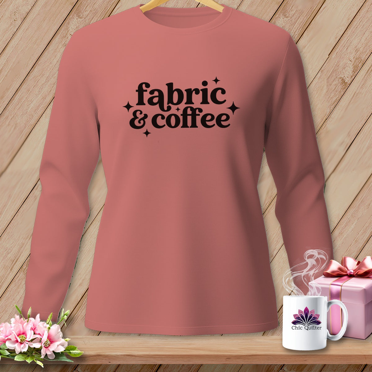 Long-sleeve shirt with "fabric & coffee" text, mug, and gift.