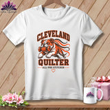 White crewneck t-shirt with orange and black graphic featuring a bulldog carrying a spool and the text 