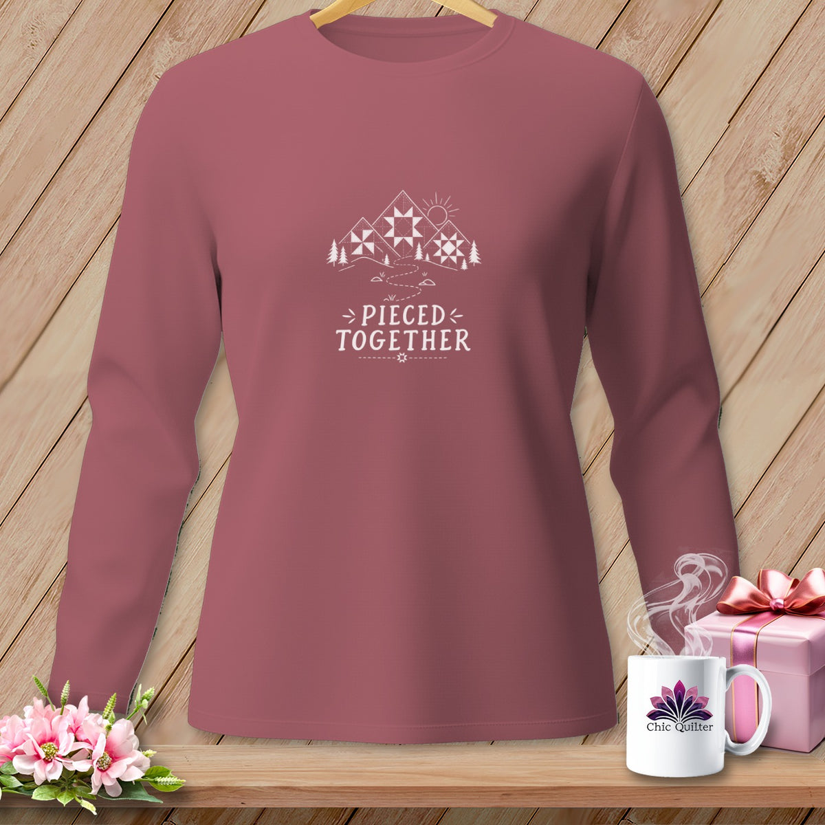 Long-sleeve t-shirt with white graphic design and text "Pieced Together."