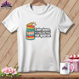 White t-shirt featuring a graphic of a glass jar filled with folded fabric and text reading Calm down, it is just one more fat quarter.