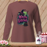 Brown long-sleeved shirt with a black cat wearing a witch hat and holding a broom.