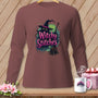 Brown long-sleeved shirt with a black cat wearing a witch hat and holding a broom.