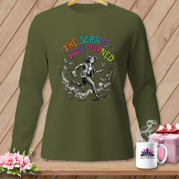 Olive green long sleeve shirt with a graphic of a running woman and bats.