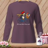 Penguin on a bicycle with fabric rolls and gifts, saying 