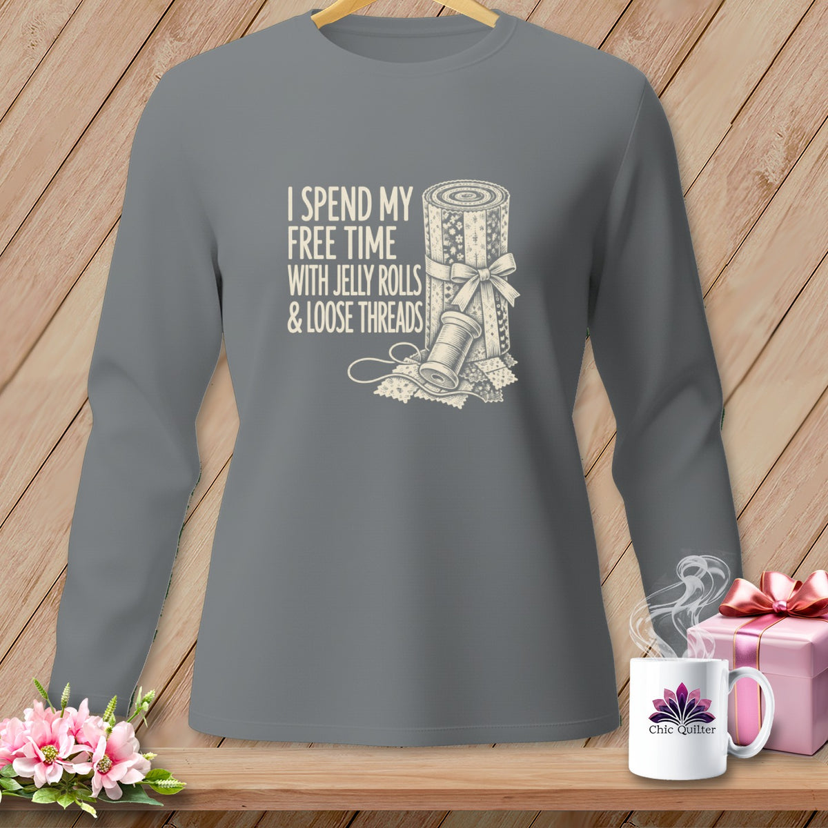 Gray long-sleeve shirt with "I spend my free time with jelly rolls & loose threads" text.