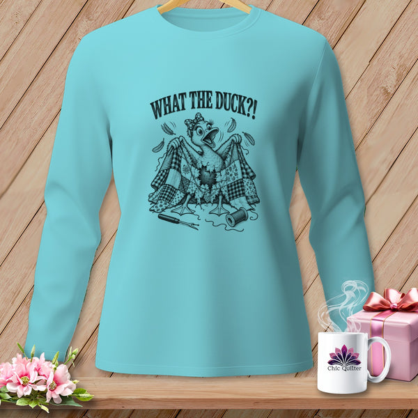 Light blue long-sleeved shirt with a black graphic of a duck and the text WHAT THE DUCK?!