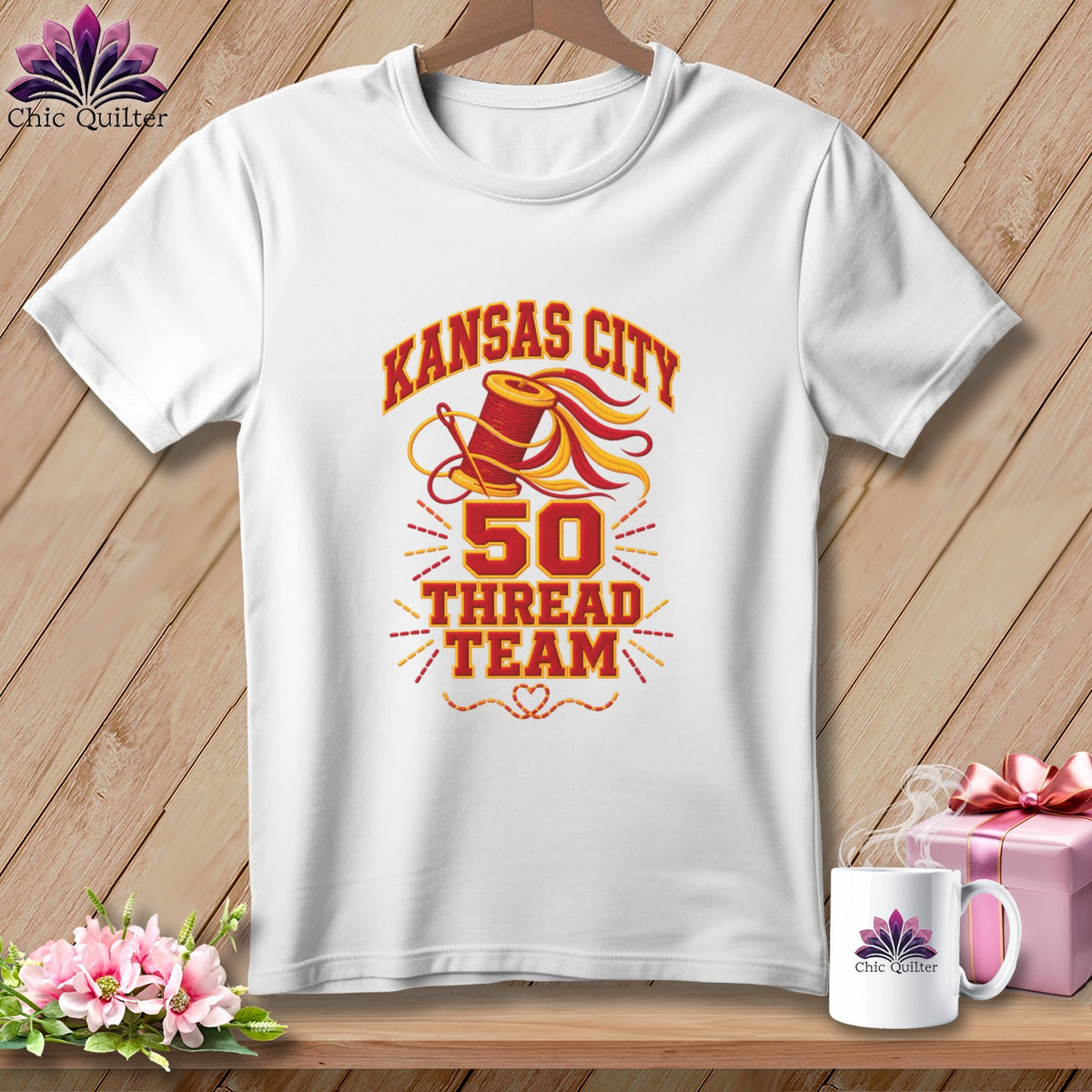 White t-shirt featuring Kansas City 50 Thread Team text, a spool, needle, and decorative graphics.