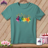 Teal t-shirt with colorful sewing notions and fabric squares graphic.