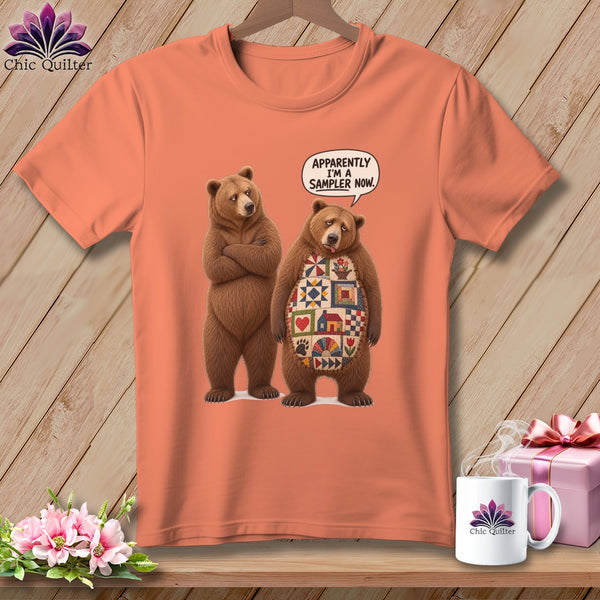 Two cartoon bears on a peach t-shirt; one says "Apparently I'm a sampler now."