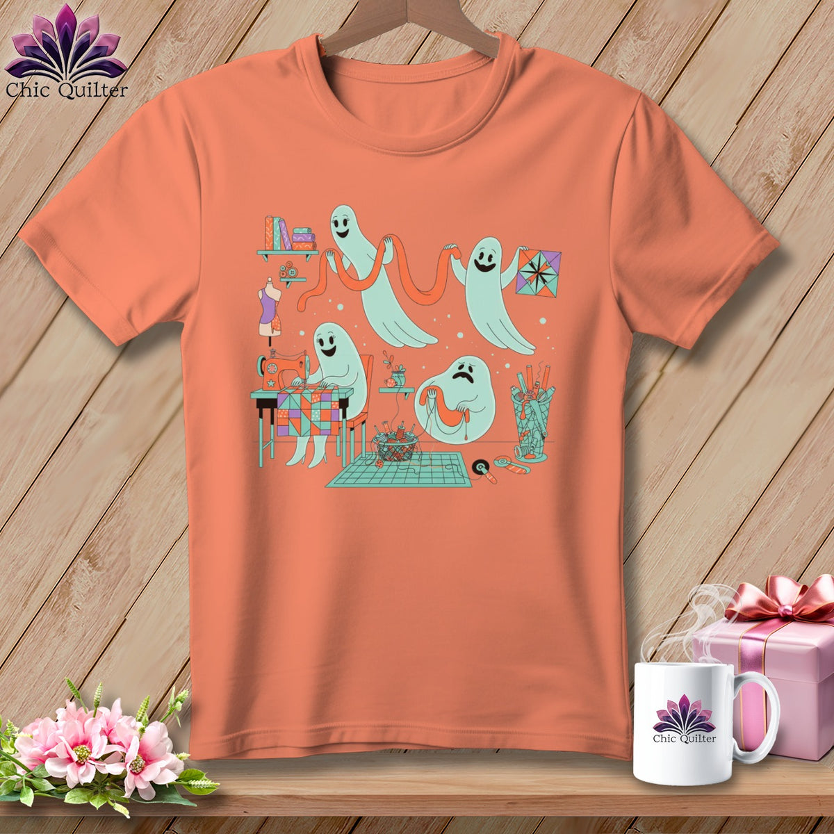 Peach t-shirt with a screen print of cute ghosts sewing and crafting.