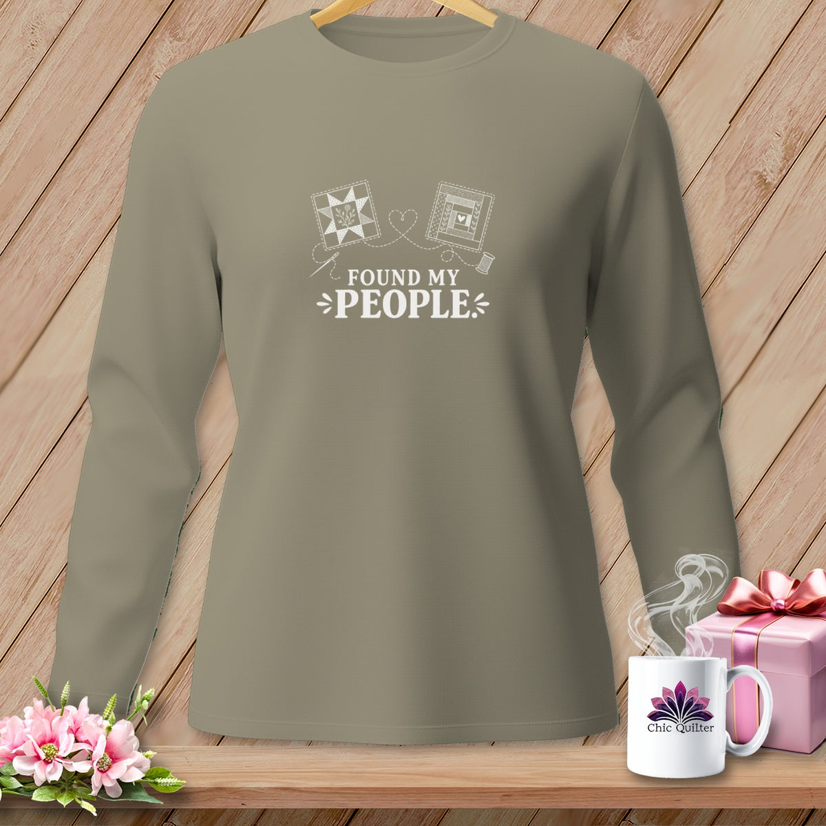 Long sleeve shirt with "FOUND MY PEOPLE" text and quilting motifs.