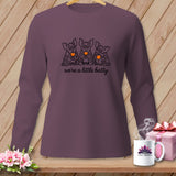 Purple long-sleeve shirt with three cartoon bats and text 