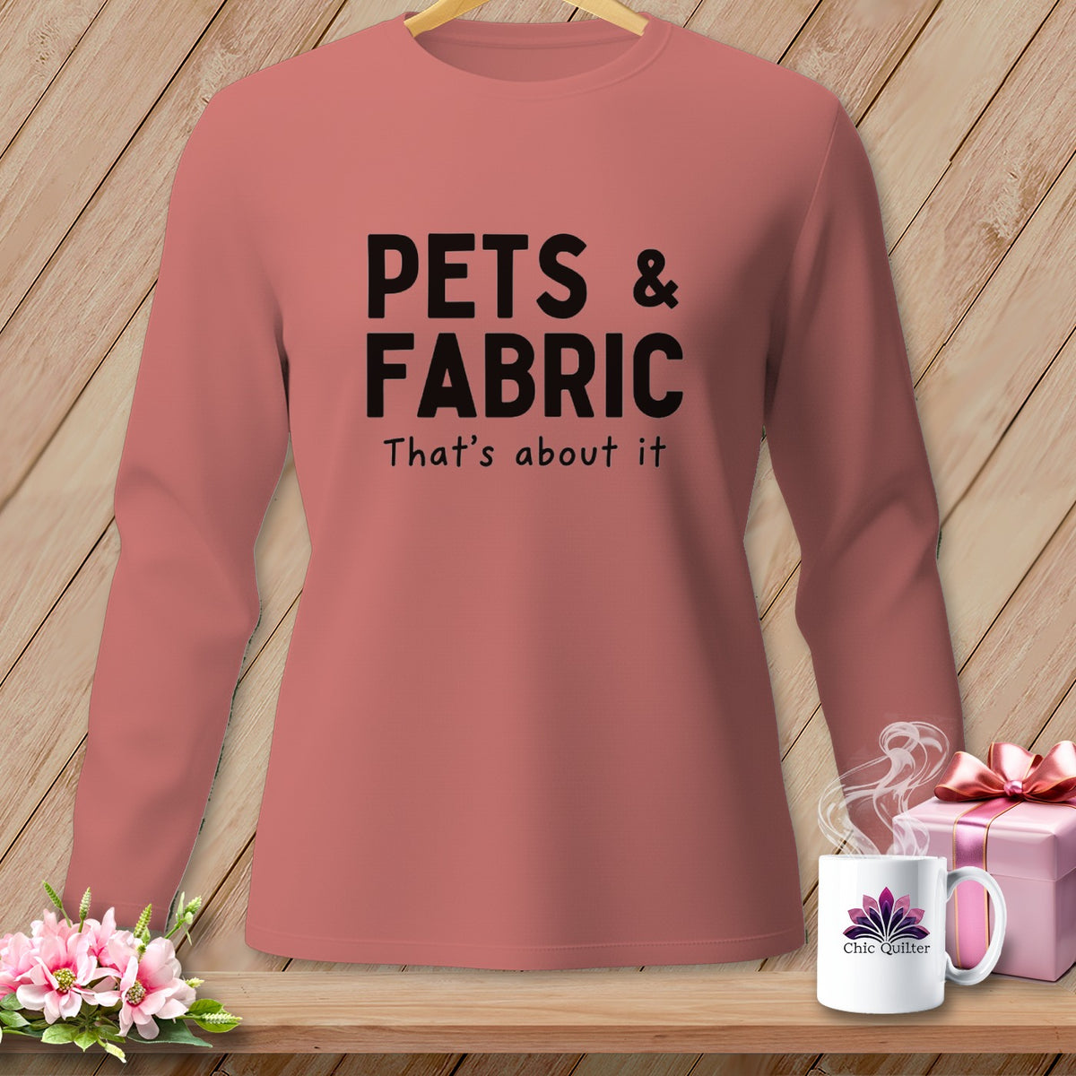 Long sleeve t-shirt with "PETS & FABRIC" graphic and floral logo mug.