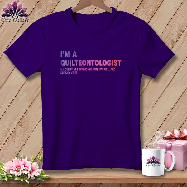 Purple t-shirt with "I'm a Quilteontologist" text and "Chic Quilter" logo.