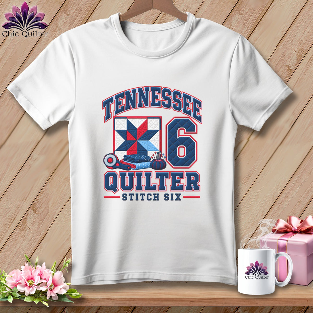 A white t-shirt features a graphic with the text TENNESSEE QUILTER STITCH SIX, a quilt block, a rotary cutter, and the number six.