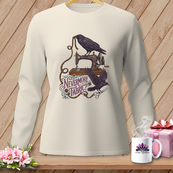 Cream long-sleeve shirt with ravens, sewing machine, and "Nevermore Fabric?" text.
