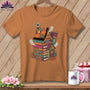 T-shirt with a quirky sewing-themed house illustration featuring books, ghosts, and sewing supplies.