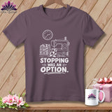 Purple t-shirt with sewing machine, fabric, and clock graphic and 