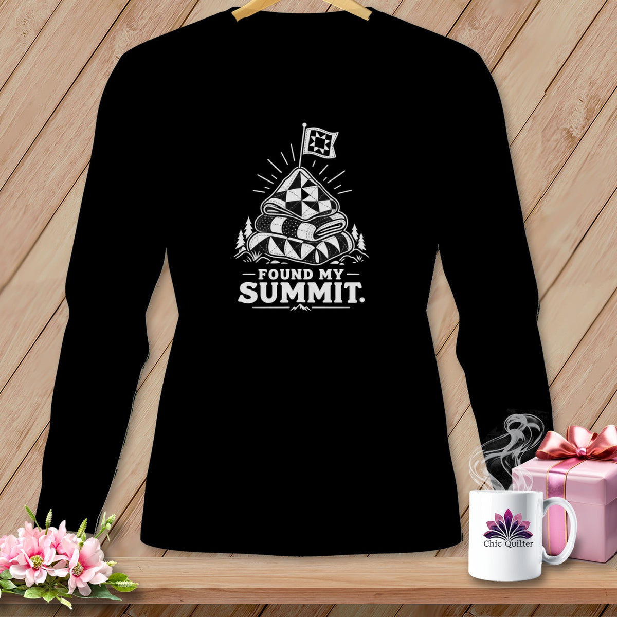 Black long-sleeve shirt with quilt stack, flag, and text "FOUND MY SUMMIT".