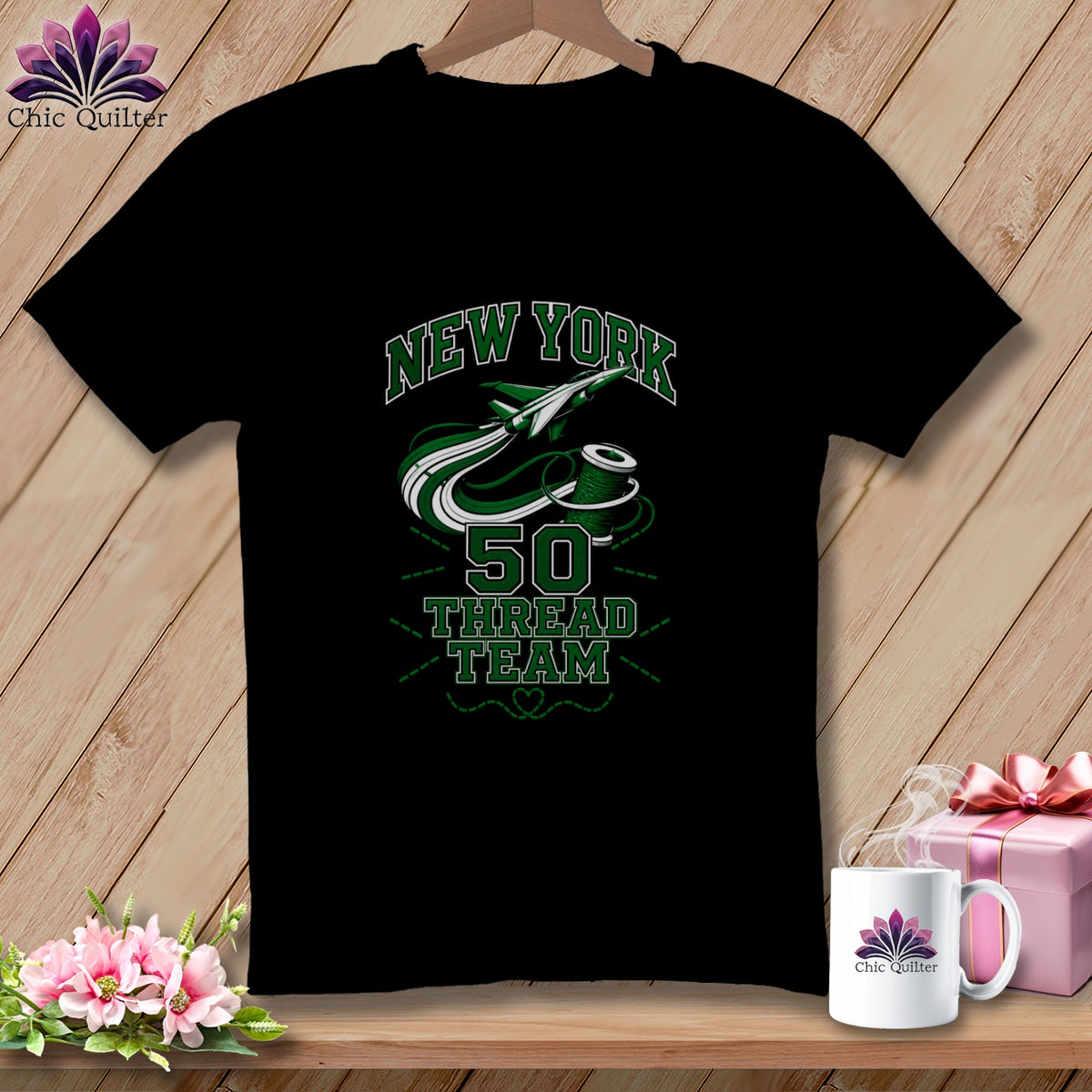 Black t-shirt featuring green graphic text reading New York 50 Thread Team with an airplane and spool motif.