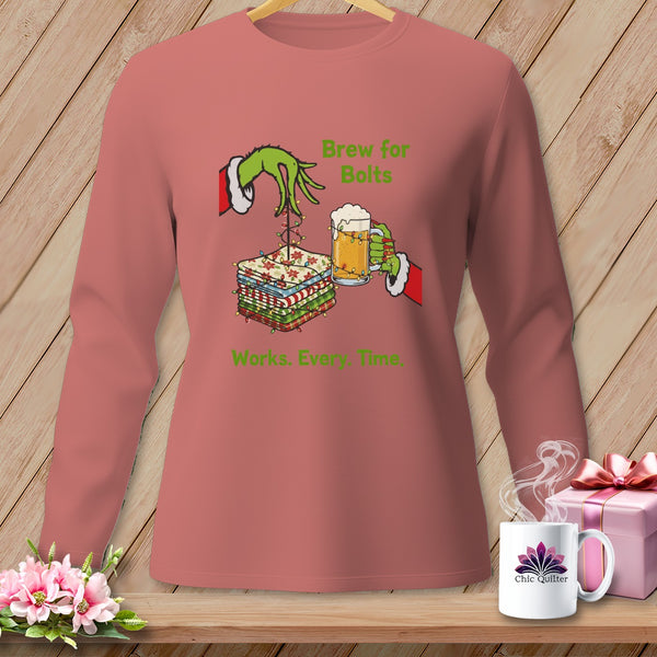 Grinch hands with fabric stacks and beer, text "Brew for Bolts Works. Every Time."