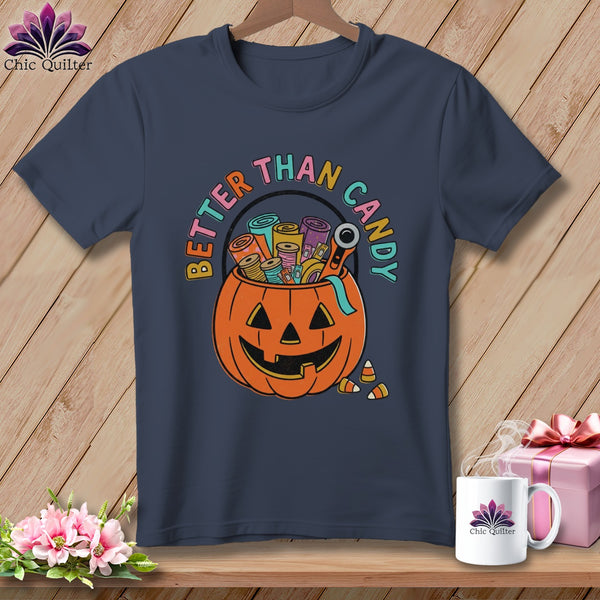 Dark blue t-shirt with jack-o'-lantern filled with sewing supplies and text "BETTER THAN CANDY".