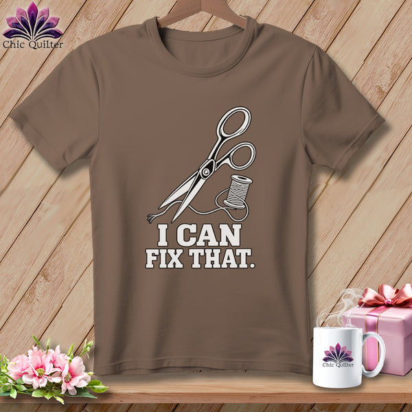 Brown t-shirt with scissors, thread, and text "I CAN FIX THAT."